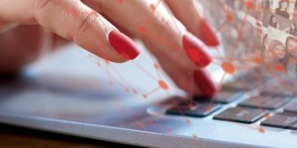 computer keyboard and female hand