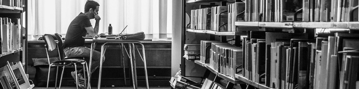 man sitting in library