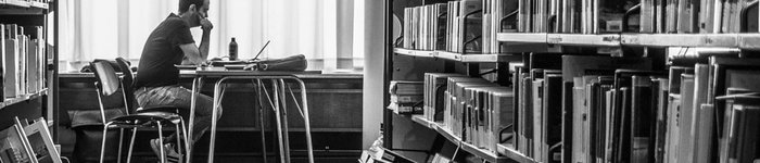 man sitting in library