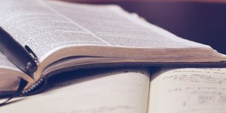 open book and fountain pen