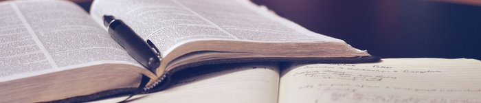 open book and fountain pen